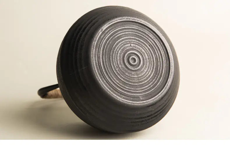 Cast Iron Tea Kettle with Spiral Pattern Design