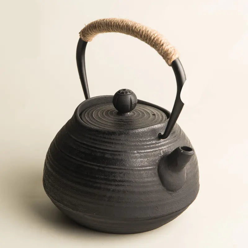 Cast Iron Tea Kettle with Spiral Pattern Design